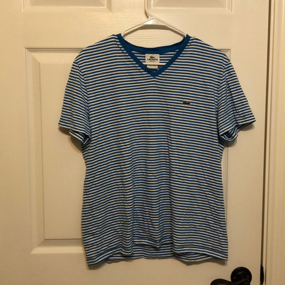 Blue and white striped Lacoste tee shirt